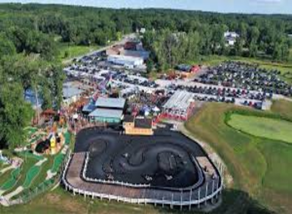 Shot of Zao Island showing go-kart track & mini-golf with parking around it.